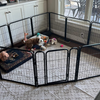 A dog in an indoor playpen
